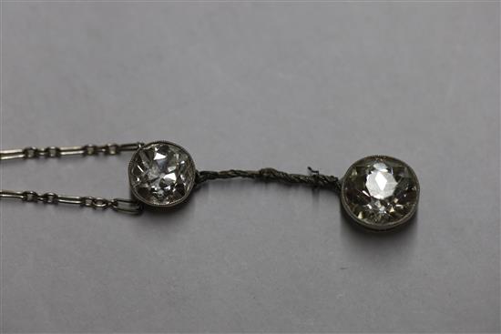 A 1930s/1940s white gold? and two stone diamond set drop pendant necklace (a.f.),